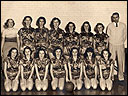 Girls basketball team with Coach McCoy.